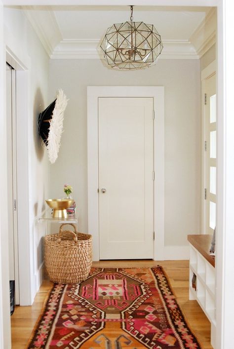 Entryway with patterned red and pink rug and woven basket Bright Hallways, Rug Makeover, Revere Pewter, A Rug, Style At Home, Ikea Hacks, Eclectic Home, Reading Nook, Home Fashion