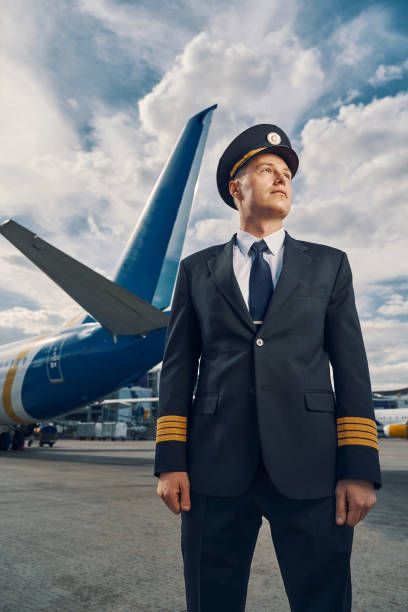 29,956 Airline Pilot Photos and Premium High Res Pictures - Getty Images Pilot Senior Pictures, Jet Photoshoot, Male Pilot Aesthetic Airplane, Pilot Photoshoot, Pilot Pictures, Pilot Selfie, Pilot Taking Selfie, Pilot Photo, Short Mehndi Design