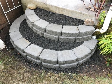 You can make these sturdy curved stairs out of concrete blocks and gravel for secure footing. This is a guide about how to make stacked block stairs. Cinder Block Stairs Outdoor, Landscape Blocks Ideas, Cinder Block Stairs, Concrete Block Steps, Cinder Block Steps, Porch Steps With Railing, Porch Steps With Landing, Trampoline Stairs, Steps With Railing