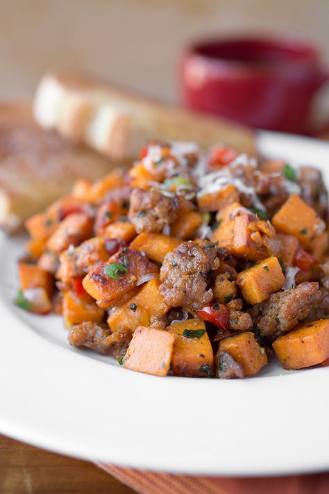 Deliciously savory, this sweet potato hash with spicy Italian sausage, onions and red bell pepper is a colorful, autumn-inspired breakfast or brunch! | thecozyapron.com #sweetpotatohash #sweetpotatohashhealthy #sweetpotatohashbreakfast #sweetpotatohashrecipes #sweetpotatohashwitheggs Sweet Potato With Sausage, Ground Sausage And Sweet Potato Recipes, Breakfast Autumn, Autumn Breakfast, Fmd Recipes, Potato Sausage, Sausage Hash, Metabolism Diet, Hash Recipe