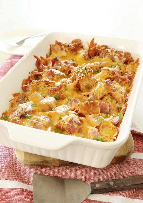 This ham and cheese croissant breakfast casserole is the best way to use your leftover ham. A savory breakfast bake with cubed croissants, ham, cheese and eggs. Ham And Egg Croissant Casserole, Croissant Ham And Cheese Casserole, Ham And Cheese Croissant Breakfast Casserole, Ham Croissant Breakfast Casserole, Cubed Croissants, Ham And Cheese Croissant Casserole, Ham Egg Bake, Overnight Egg Casserole, Croissant Casserole