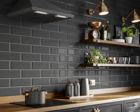 7 dated decorating trends to avoid in 2022 (and what to try instead) | Real Homes Grey Metro Tiles Kitchen, Brick Tiles Kitchen, Skoolie Kitchen, Metro Tiles Kitchen, Grey Kitchen Tiles, Dark Grey Tile, Grey Kitchen Walls, Kitchen Revamp, Grey Wall Tiles