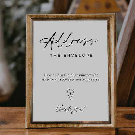 "EVERY PURCHASE COMES WITH A FREE 7 PAGE WEDDING CHECKLIST Also, please enjoy 60% off this item when you copy and paste the link below. https://lovelanepress.ck.page/discountcode -------------- DESCRIPTION -------------- Make your bridal shower truly special with our modern minimalist \"address the envelope\" bridal shower sign. This fully editable template puts the creative control in your hands, allowing you to customize every detail to match your unique style. Embrace the elegance of the modern minimalist design as you prepare to celebrate the upcoming wedding. With this template, you can effortlessly create a chic and personalized sign that will add a touch of sophistication to your event. Let your creativity shine and craft an envelope addressing station that will leave a lasting impr Bridal Shower Sign, Bridal Shower Decor, Boho Bridal Shower, Shower Sign, Bridal Shower Signs, Addressing Envelopes, Wedding Checklist, Boho Bridal, Shower Decor