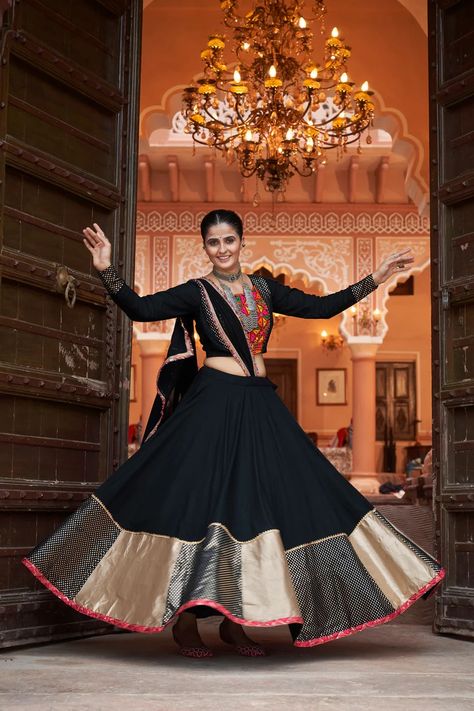 This festive season, redefine sophistication with our exclusive Black Navaratri Collection. Featuring exquisite designs that blend traditional charm with modern elegance, each piece is crafted to make you stand out and celebrate in style. . . . Shop Now: www.mohifashion.com . . . . #lehenga #lehengacholi #designerlehenga #weddinglehenga #lehengas #lehengainspiration #lehengagoals #lehengasmumbai #lehengabanglore #lehengasaree #lehengalove #LehengaLookBook #lehengasalwarsuit #lehengashot Chania Choli, Navratri Lehenga, Chaniya Choli Designs, Garba Dress, Ghaghra Choli, Mirror Work Blouse, Navratri Festival, Black Lehenga, Georgette Lehenga