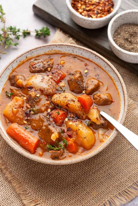 This hearty beef stew is a pressure cooker gem. Lots of tender meat, flavorful root vegetables, and a silken sauce makes it the best one-pot dinner there ever was! An easy homemade instant pot recipe. Indian Beef Stew Recipe, Beef Stew Instant Pot, Thick Beef Stew, Spicy Beef Stew, Instant Pot Stew, Hearty Beef Stew, Ground Beef Pasta, Stew Meat Recipes, Spiced Beef