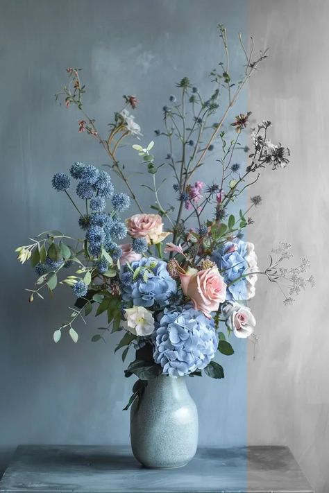 Full Color Image in ai-img-gen.com 🔸 minimalistic floral arrangement on a gray table and a dusty blue background. Front view 🔸 From Midjourney AI Image Large Blue Floral Arrangements, Blue Fall Floral Arrangements, Blue Hydrangea Flower Arrangements, Blue Hydrangea Arrangements, Blue Floral Arrangements, Blue Flower Arrangements, Hydrangea Flower Arrangements, Blue Foliage, Blue Hydrangea Flowers