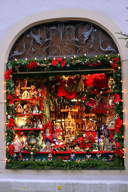 Rothenburg Christmas Window in Germany - the red helps unify the many objects on display Christmas In Germany, Lights Wallpaper, Christmas Window Display, Store Window, German Christmas, Christmas Store, Christmas Window, Christmas Scenes, Christmas Display