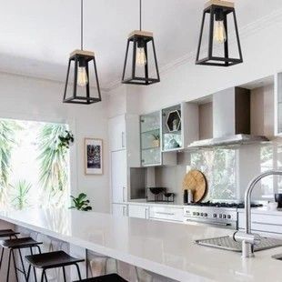 (paid link) Kitchen Lighting Trends - Does your kitchen need a boost of style? Read about 4 great kitchen lighting trends! Lantern Pendant Lighting Over Island, Timber Pendant Lighting, Lights Over Island, Hamptons Kitchen, Modern Lanterns, Black Light Fixture, Pendant Light Shades, Wood Pendant Light, Single Pendant Lighting