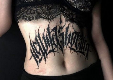 Gothic Font Stomach Tattoo, Gothic Lettering Stomach Tattoo, Lettering On Stomach Tattoo, Metal Script Tattoo, Stomach Script Tattoo, Stomach Lettering Tattoo Women, Gothic Stomach Tattoo, Chest Tattoo Script, Black Metal Tattoo