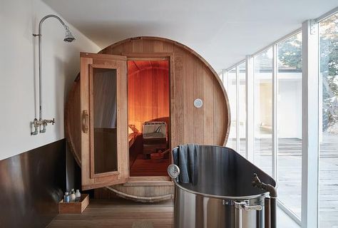 The sauna and ice bath in a first-floor corridor. Rick Rubin, Home Sauna, Malibu Home, Cold Plunge, Barrel Sauna, Sauna Design, Ice Bath, Outdoor Sauna, Sauna Room