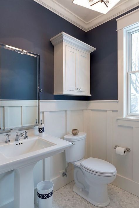 Board and Batten Bathroom. What a great bathroom design! I love the combination of board and batten wainscoting with navy walls painted in Newburyport Blue by Benjamin Moore. The board and batten wainscoting was enameled in BM White Dove. The wainscoting was installed using multiple trim boards at approximately 54" height. The floor tile is a marble hexagon.: Bathroom Wainscotting, Newburyport Blue, Board And Batten Wainscoting, Bathroom Wainscoting, Wainscoting Height, Makeover Kamar Mandi, Beadboard Bathroom, Navy Bathroom, Standard Bathroom