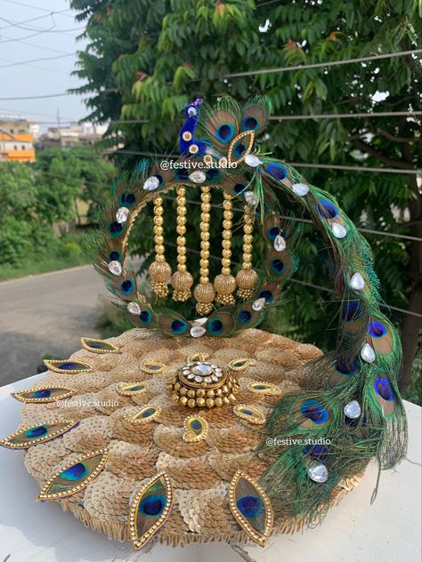 Customised Singhasan for laddu gopal 😍 DM for bookings now ✨ Shipping WORLDWIDE 🌍 Contact us on +919410477888 DM for bookings and details only at @festive.studio #janamashtami #krishna #laddugopal #krishnajanmashtami #krishnalove #peacockfeather #handmadedecor #culturalgifts Singhasan Design Handmade, Kansar Thali Decoration Ideas, Krishna Aasan, Laddu Gopal Singhasan, Haldi Tray, Mehendi Platter, Thai Decoration, Handmade Hamper, Engagement Themes