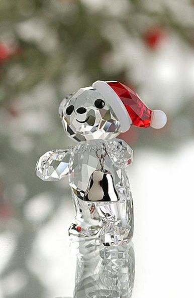 Swarovski code number: 5003400  Not to be missed for the holiday season! The 2013 Annual Edition Kris Bear shines in clear crystal and wears a Santa Claus outfit with a red hat and real, silver-tone metal bell. The year of issue is engraved on the bear's right leg.  Size: 3.4 x 4 cm Designer: Keiko Arai Introduced: 2013 Retired: 2013 Swarovski Figurines, Santa Claus Outfit, Swarovski Christmas, Swarovski Crystal Figurines, Apple Art, Crystal Ornament, Crystal Figurines, Glass Figurines, Christmas Charms