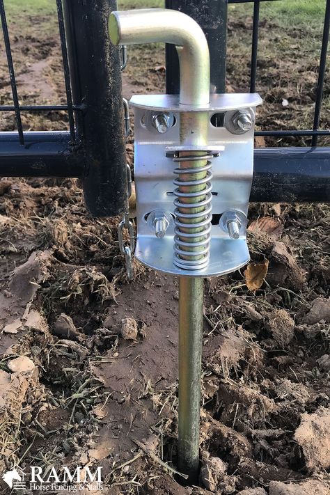 Installing a gate anchor is like having an extra pair of hands when you need them most. This gate anchor keeps gates in place while you move horses, cattle, or equipment through the gate opening, all while preventing the gate from sagging! Simple to use; this anchor only requires you to apply pressure to the pressure plate for it to move up and down smoothly. It's by far the most useful tool in the gate latch family. #gateanchor #rammfence #equestrian #flexfence #horses #horsefence #fencegate Yard Privacy Ideas, Cattle Gate, Fences Alternative, Horse Fence, Yard Privacy, Farm Hacks, Privacy Ideas, Goat Barn, Horse Fencing