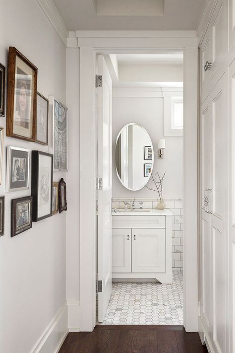 32 Half Bathroom Ideas That Prove It's the Perfect Place to Experiment With Design Neutral Bathroom Paint, Neutral Bathroom Paint Colors, Timeless Bathrooms, Bathroom Wainscoting Ideas, Hexagon Tile Bathroom, White Hexagon Tiles, Hexagon Tile Floor, Gray And White Bathroom, White Marble Bathrooms