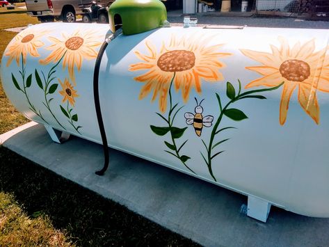 Blooming propane ideas Well Tank Cover Ideas, Lp Tank Painted, Painted Gas Tanks, Painting Propane Tanks, Painting Propane Tanks Ideas, Propain Tanks Painted, Paint Propane Tank Ideas, Oil Tank Cover Ideas, Propane Tank Painting Ideas