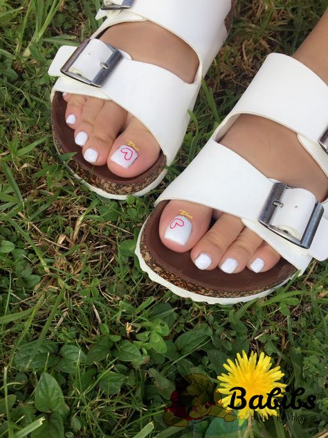 White and heart nail art pedicure #pedicure #toes #toenailart #nailart #simple #white #heart #love White Pedicure With Flower Design, Pedicure Heart Designs, Pink And White Pedicure Toenails, White And Pink Pedicure, Toe Nails White Design, Heart Pedicure Designs, Heart Toenails, White Pedicure With Design, Pedicure Designs Toenails White