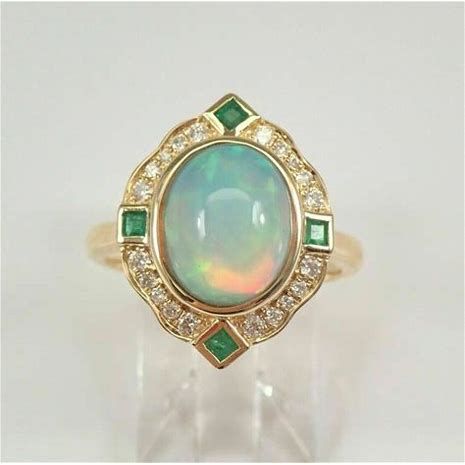 Emerald Cut opal Engagement Ring - Bing - Shopping Halo Engagement Ring Emerald, Opal Ring Gold, Halo Engagement Ring, Halo Engagement, Brilliant Diamond, Opal Rings, Womens Jewelry Rings, Fire Opal, Oval Cut