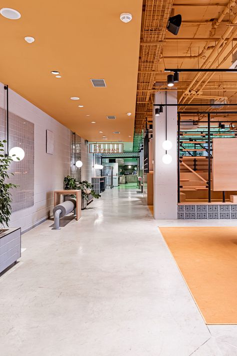 Masquespacio Creates Bold Student Housing Using Minimal Materials - Metropolis Student Residence, Exposed Ceiling, Veuve Cliquot, Office Ceiling, Open Ceiling, School Interior, Office Space Design, Student Housing, Student House