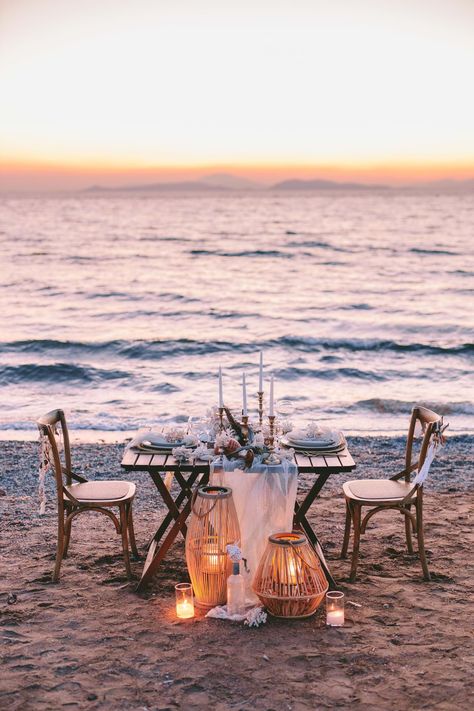 This sunset wedding dinner set at a private beach of the Athenian Riviera is an ode to the laid back luxury and summer vibes | Athens Wedding Planner & Designer: @mitheoevents Photo: @pahountisg Venue: Kavouri private beach | #mitheoevents #weddingplannergreece #destinationweddingplanner #athenswedding #elopement #beachwedding #intimatewedding #seathemewedding #weddingdinner #weddingstyling #weddingdecor #romanticdinner #beachdinner #tablesetting #beachdecor #sunsetdinner #tablescape Romantic Dinner At Beach, Private Wedding Dinner For Two, Private Beach Dinner, Beach Dinner Ideas Romantic, Romantic Beach Picnic Couple, Private Dinner For Two Romantic, Beach Romantic Dinner, Beach Set Up, Dinner On Beach