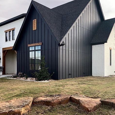 My favorite modern farmhouse went under contract over the weekend White Brick And Black Exterior, Contrast House Exterior, White Brick Black Board And Batten, White Brick Black Siding Exterior, White Brick With Black Siding, Limewash Brick With Black Trim, Black White Wood Exterior, Black Siding And Brick, Black Siding With White Brick