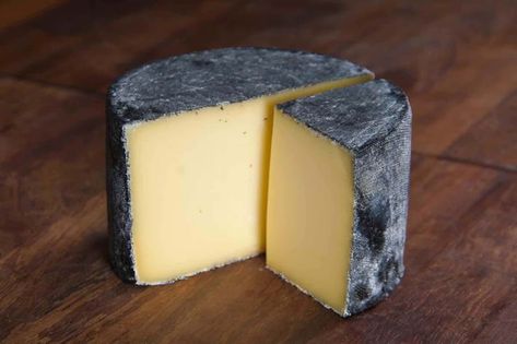 Cornish Kern from British maker Lynher Dairies is a true winner - literally. It beat out 3,000 other entries at the 2017 World Cheese Awards! It’s made like a traditional Gouda, but with Alpine starter cultures added to create its close-knit texture and unique range of flavors that include pineapple, roasted cashews, and fresh grass. Get your hands on a wedge if you can but good luck! This champion is sold out in stores around the globe. English Cheese, Starter Cultures, Cow's Milk, Queso Cheese, Roasted Cashews, Milk And Cheese, Summer Eating, English Food, Wine Cheese