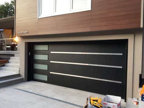 Modern Exterior Garage Door | Toronto - Modern Doors Exterior Garage Door, Contemporary Garage Doors, Tor Design, Contemporary Garage, Single Garage Door, Ranch Gates, Garage Door Windows, Garage Gate, Modern Garage Doors