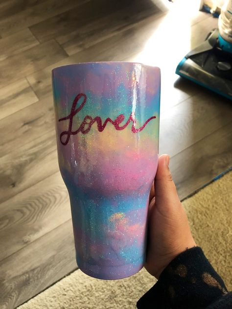 soooooo i had this on etsy but it was taken down 😭 but i hanf painted this cup and tried to go with the lover theme and i think it worked pretty well. doesnt this cup need to calm down? 😉 Also I sell this 💞 #taylorswift  #lover #swiftie #youneedtocalmdown #glittertumbler #etsy #tumbler #rainbow #clouds #handmade #handpainted #withlovelilly #cups #30oz #resin Taylor Swift Tumbler Ideas, Taylor Swift Cup Ideas, Taylor Swift Tumbler Cup, Taylor Swift Ceramic Ideas, Taylor Swift Cup, Taylor Swift Glitter, Preppy Taylor Swift, Taylor Swift Diy, Painted Tumblers