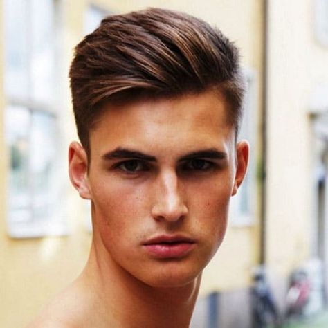 A comb over fade or slicked back undercut is a good choice to balance the roundness of your face. Other examples of oval face haircuts for men include the quiff, pompadour, faux hawk, brush back, and any other short to medium-length cut that doesn't sit flat. Oval Face Haircuts Men, Small Hair Cut, Oval Face Men, Hair Cut Guide, Haircut For Face Shape, Hawaiian Recipes, Chemistry Humor, Brooklyn Decker, Library Skills