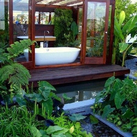 I love how this is an outdoor bath with the option of closing the doors, and the greenery looks beautiful.: Bathroom Courtyard, Plant Interiors, Outdoor Bathtub, Contemporary Garden Design, Outdoor Baths, Outdoor Bathroom, Natural Bathroom, Outdoor Bath, Garden Bathroom