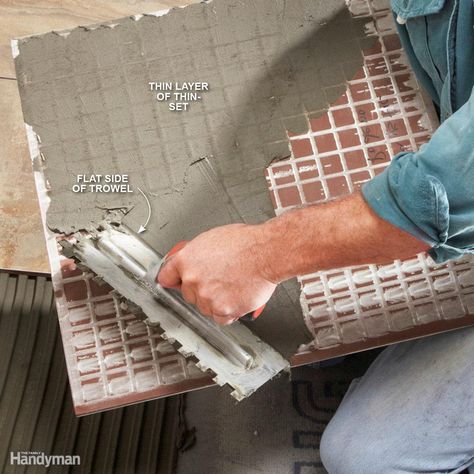 Back-butter large tiles (> 8x8) with the flat side of the trowel in addition to laying a notched layer of mastic on the floor. Laying Tile, How To Tile, How To Lay Tile, Tile Repair, Elegant Tiles, The Family Handyman, Large Tile, Ceramic Floor Tiles, Modern Tiles