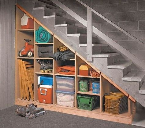 Maximize that tricky under-the-stairs storage spot with these tips. 5 Basement Under Stairs Storage Ideas | Shelterness Under Basement Stairs, Under The Stairs Storage, Under Stair Storage, تحت الدرج, Under Stair, Casa Hobbit, Basement Organization, Stairs Storage, Remodel Diy