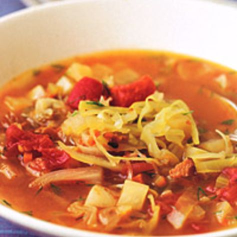 Great Reviews!!! There's nothing more comforting than a warming bowl of cabbage soup. Ours conjures up memories of beloved, slow-cooked Eastern European versions; yet ... Sweet And Sour Cabbage Soup, Sour Cabbage Soup, Escarole Soup, Sweet And Sour Cabbage, Cold Soup Recipes, Cabbage Soup Recipe, Warm Soup Recipes, Sour Cabbage, Fat Burning Soup