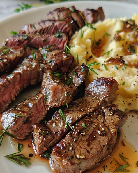 GARLIC BUTTER STEAK BITES AND MASH 🥩🧈 Ingredients: 1 lb sirloin steak, cut into bite-sized pieces Salt and pepper, to taste 2 tbsp olive oil 4 tbsp unsalted butter 4 cloves garlic, minced 1 tbsp fresh parsley, chopped Mashed Potatoes: 4 large potatoes, peeled and cubed 1/2 cup milk 4 tbsp unsalted butter Salt and pepper, to taste Directions: Step 1: Prepare the Mashed Potatoes Place the cubed potatoes in a large pot and cover with water. Add a pinch of salt and br... Lamb Chops And Potatoes, Steak With Mashed Potatoes, Food Aversion, Stadium Food, Steak And Mashed Potatoes, Brooklyn Food, Garlic Butter Steak Bites, Butter Steak Bites, Steak And Potatoes