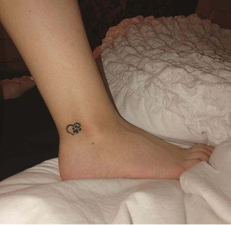 #ankle #ankletattoo #tattoo #cat #heart #paw #pawprint #smalltattoo #tat Paw Print Tattoo Ankle, Paw Print Tattoo On Ankle, Paw Print Ankle Tattoos For Women, Tiny Paw Print Tattoo Ankle, Small Tattoos Cat Paw, Dog And Cat Tattoo Ankle, Cat Paw Print Tattoo On Wrist, Heart Tattoo Ankle, Cat Paw Print Tattoo