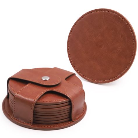 TOSSOW Coasters for Drinks, PU Leather Coaster 8 Pcs with Holder, Durable and Non-Slip Coaster for Protection Tabletop, Wooden Table, Desk, Bar, Coasters Fit All Cups (Brown) PU Leather Design: Our round coasters are made of PU leather material, leather surface is smooth but not slip and slide on surfaces. Both sides leather and sewn with threads stitches run through and looks really classy and elegant.PU leather it's a faux leather, is a poly synthetic split leather. Round Coaster Size: Coaster diameter: 3.58 inch(9.1 cm), Coaster thickness: 0.12inch(0.3 cm). Package include 8 PCS with PU leather holder, they come in a holder so they don't get misplaced. Large enough to hold most of the cups and glasses, perfect coasters for both hot and cold beverages. Easy to Clean: They easy to clean, Leather Kitchen Accessories, Leather Gifts For Men, Desk Bar, Leather Coaster, Black Coasters, Leather Kitchen, Diy Leather Projects, Leather Scrap, Laser Projects