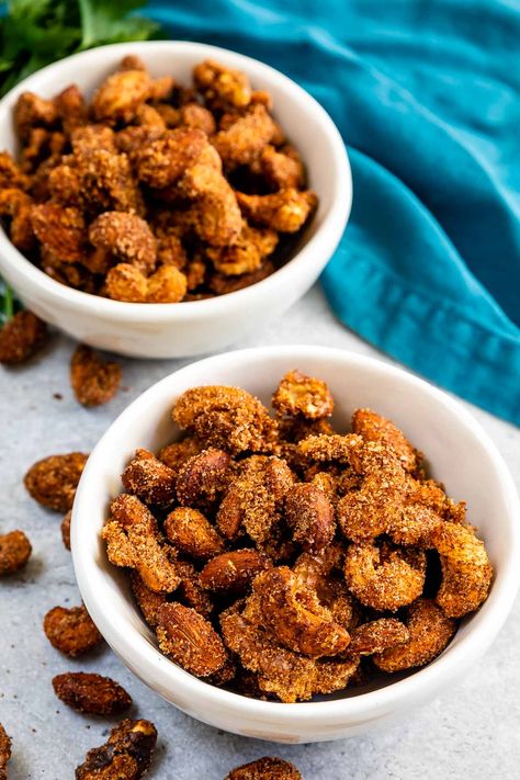 These sweet and spicy nuts consist of cashews, almonds, and walnuts coated in a sweet and spicy seasoning mix and baked until crunchy and toasted. Sweet And Spicy Peanuts Recipe, Seasoned Cashews, Spicy Nuts Recipe, Roasted Nuts Recipe, Spicy Almonds, Christmas Nuts, Spicy Nuts, Holiday Appetizers Easy, Spicy Seasoning