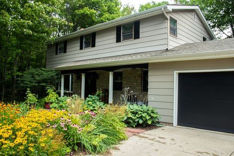 Black Garage Door and Black Trim, How to Paint a Garage Door, Black Garage Door with Tan House Black Garage Doors Tan House, Tan Siding, Black Garage Door, Black Garage Doors, Side Hinged Garage Doors, Garage Door Paint, Black Garage, Tan House, Garage Door Types