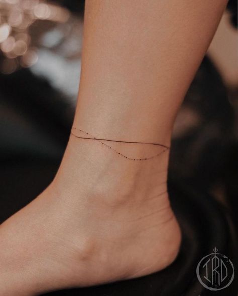 Tattoos Ankle Bracelet, Simple Body Tattoos For Women, Minimalist Bracelet Tattoo, Band Ankle Tattoo, Anklet Tattoos For Women Simple, Line Tattoo Ankle, Anklet Tattoos Wrap Around, Ankle Chain Tattoo, Wrap Around Ankle Tattoo