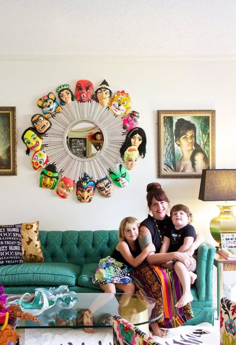 Jennifer Perkins Halloween home tour on Apartment Therapy. Estilo Kitsch, Halloween Decorations Apartment, Green Couch, Country Living Magazine, Halloween Vintage, Halloween Decorations Indoor, Kids Halloween, Halloween Bats, Outdoor Halloween