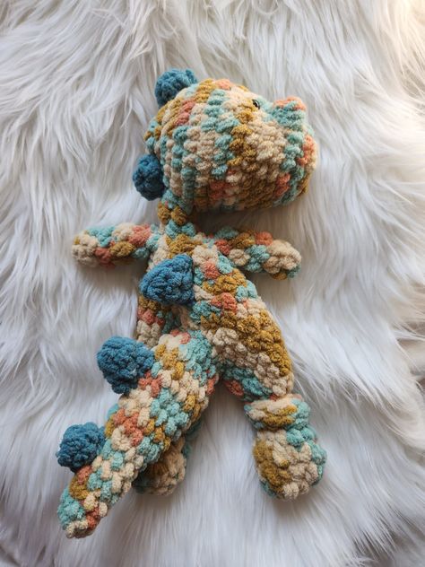 Crochet Dinosaur Snuggler Multicolour Purple Crochet Dinosaur Snuggler, Knitting Plushies, Crochet Snuggler, Lovey Pattern, Crochet Lovey, Crochet Monsters, Crochet Geek, Crochet Dinosaur, Crochet Baby Toys