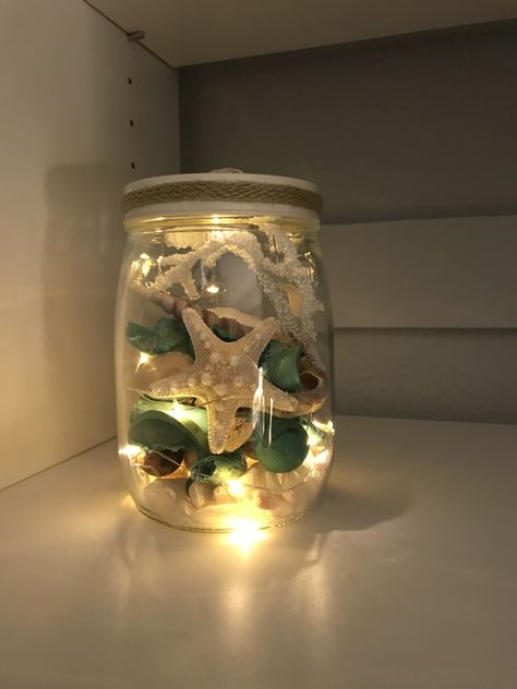 Shell Jars Seashells, Bathroom Decor Sea Beach Themes, Fairy Light Jar Ideas, Sand And Shells In A Jar Ideas, Jar Of Shells, Seashell Jar, Shell Jar, Memory Decor, Mason Jar Terrarium