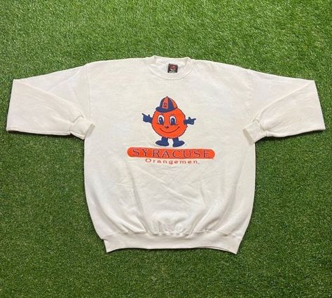 Vintage Syracuse University Sweatshirt Good Vintage Condition Made by PM Sports in the USA Each Vintage item is unique and fits differently. Please refer to measurements for the best fit. Size XL Width 25.5 in Length 29.5 in Slightly Stained * I ship all items in two or three business days and utilize Priority Mail options via USPS. Expedited shipping is available upon request. If you have any questions; Please Ask! *I Ship International!! PLEASE EMAIL BEFORE PURCHASING INTERNATIONALLY * All of Vintage College Shirts, Gym Sweatshirt, 80s Photos, University Crewneck, Fashion 2000s, Syracuse University, College Shirts, University Sweatshirts, College Sweatshirt