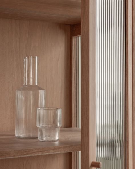 A favourite feature at our Essex Drive project is this solid white oak and fluted glass display cabinet. Spanning 1800mm with six framed doors, it’s large enough to hold the entirety of our client’s (enviable) collection of glassware and crockery, without imposing on the space. Glazing the side panels helped: with light flowing in from the west-facing side window, and a more interesting view as you enter the room from the hallway. Like all of our cabinetry, it was designed and built bespoke ... Dining Booth, Glass Display Cabinet, Fluted Glass, Glass Cabinets Display, Glass Display, Flute Glass, Side Window, Oak Finish, Pots And Pans