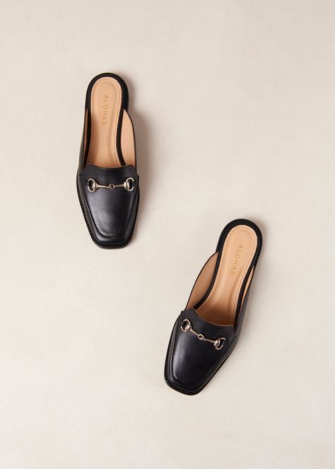 Black leather loafer mules With a pair of Kais mules in your closet, nailing the smart-casual dress code is no longer tricky terrain. Topped with snaffle-trim hardware, they have enclosed uppers made in black leather and no back - it’s like a slipper, but for the great outdoors. Loafer Mules Outfit, Mules Outfit, Smart Casual Dress Code, Black Mule, Brown Jumpsuits, Smart Casual Dress, Black Leather Mules, Sustainable Leather, Wardrobe Capsule