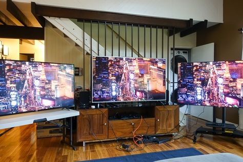 Three TVs set up side-by-side in a living room, displaying the same image. Three Tvs In Living Room, Tv Set Up, Tv Sets, Texas Homes, A Living Room, Led Tv, Living Room Tv, Apartment Ideas, Side By Side