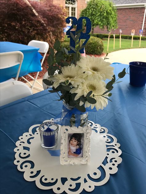 Ariana's graduation party 2017 #Graduation #Centerpiece #Gerber Daisy Blue Graduation Centerpieces, Grad Party Centerpieces, Daisy Centerpieces, Grad Party Theme, Blue Table Settings, Graduation Centerpiece, Blue Party Decorations, Graduation Tables, Graduation Party Centerpieces