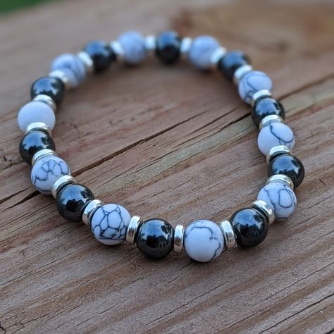 This Simple Elegant Natural Stone Bracelet Combines Beautiful White Howlite Stone Known For Calming Properties With The Strong Grounding Hematite Stones+Silver Accents. The Dark Hematite Stone Recognized For Its Ability To Absorb Negative Energy Helps Stabilize The Root Chakra. The Soothing Howlite Stones Are Believed To Calm Anger + Promote Better Sleep. This Classic Piece Is A Sleek/Sophisticated Healing Accessory To Calms The Body+Mind. Made With Durable Materials And Genuine Stones. Stone Bracelet For Men, Natural Stone Beaded Bracelets, Alt Bracelets, Men Bracelet Design, Bracelet Ideas For Men, Stone Bracelet Ideas, Beaded Jewelry For Men, Calm Anger, Beads Bracelet For Men