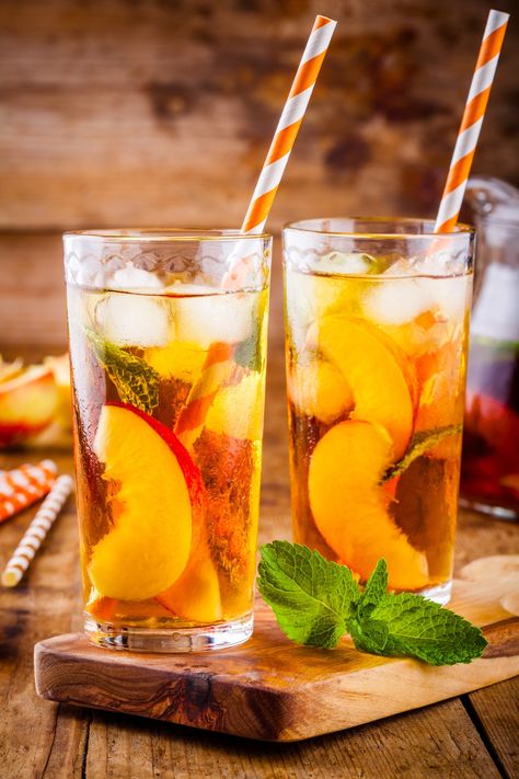 We have a new fave drink to enjoy on a sunny summers afternoon and we cant wait to share it with you! Check out the recipe for this amazing peach iced tea below https://kidspeak.uk/amazing-peach-ice-tea-recipe-homemade/ #icedtea #drink #tastydrink #refreshing #peaches #recipe Peach Iced Tea Recipe, Quick Food Recipes, Coffee And Ice Cream, Peach Iced Tea, Iced Tea Recipe, Food Factory, Peach Ice Tea, Iced Tea Recipes, Orange Paper