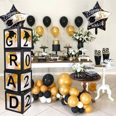 Cool Graduation Party: Decor Ideas And Fun Activities To Do It's finally time to start thinking about graduation party ideas. It might be challenging to come up with graduation party ideas that will amaze your guests, whether you are the parent of a graduate o... Graduation Table Setting, Graduation Party Decor Ideas, Graduation Party Activities, Balloon Boxes, Graduation Party Table, Party Decor Ideas, Graduation Tables, Graduation Party Ideas, Balloon Box